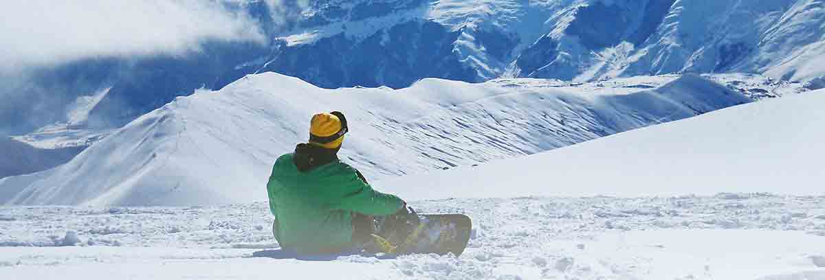 Snowboarder sitting